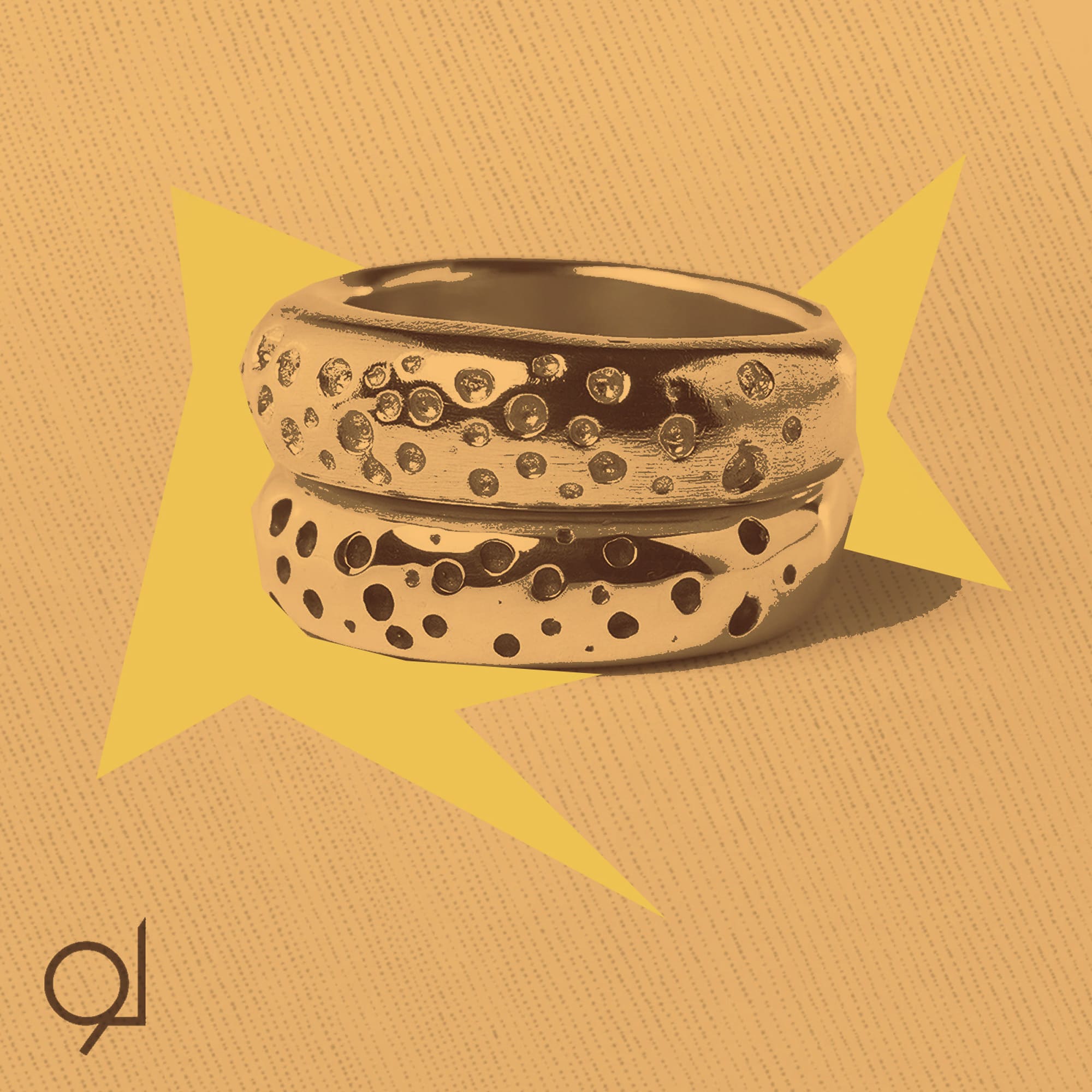 Two silver rings with textured designs and diamonds by Lamis Watfa